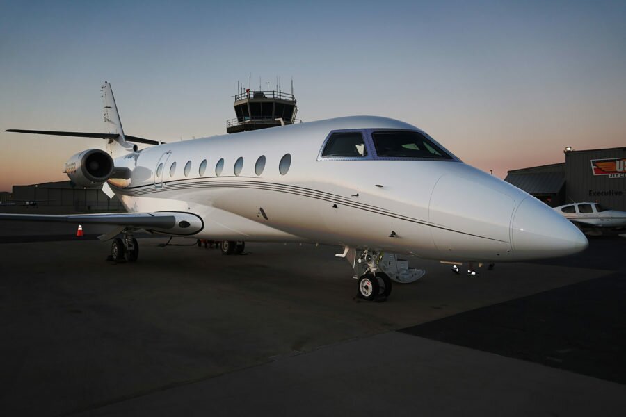 A private chartered jet on the runway of a airport